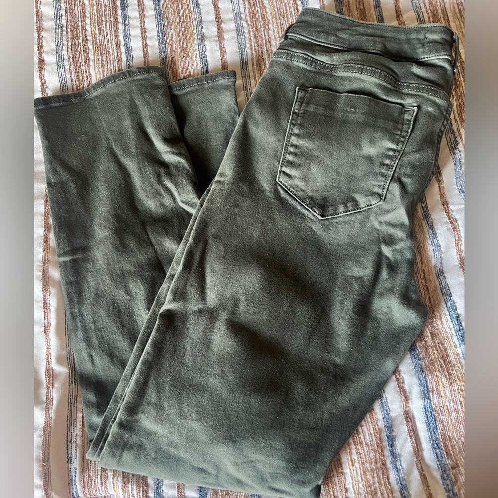 Dunnes stores size 12 dark green jeans.
